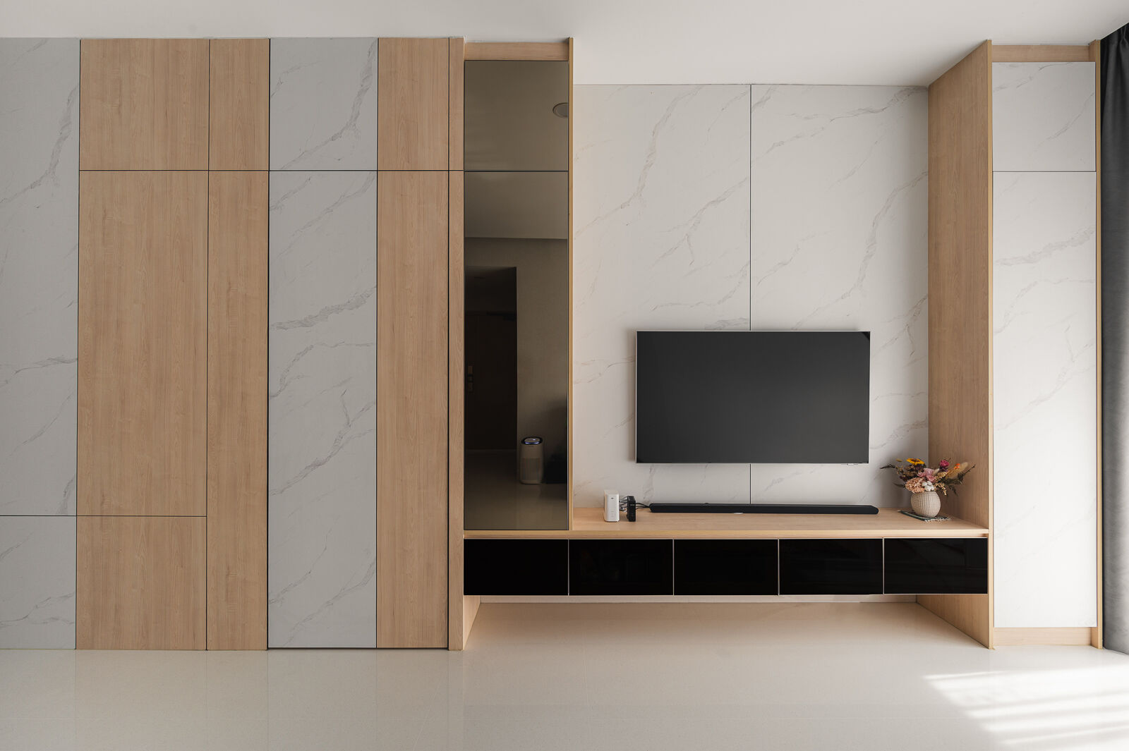 Light oak and pale stone, kept deliberately plain so the plan does the work. — The Foliage, Pasir Panjang